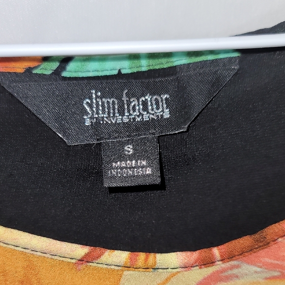 Slim Factor Orange and Black Asymmetrical Graphic Blouse - Picture 2 of 15